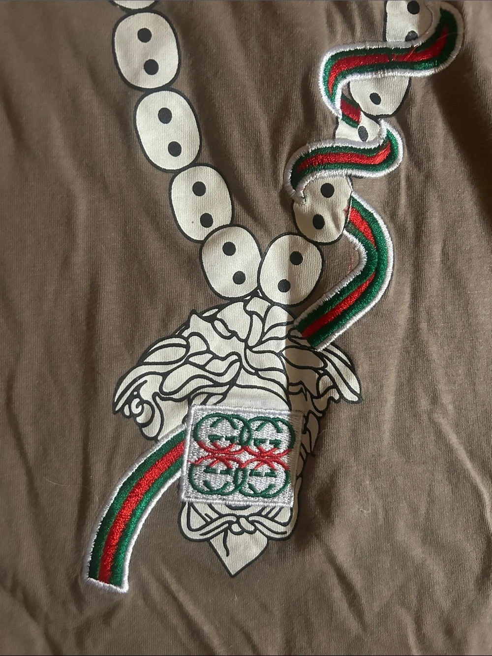 AUTHENTIC-Gucci Taupe Long Sleeve Tee / White Graphic and embroidered Green-NEW